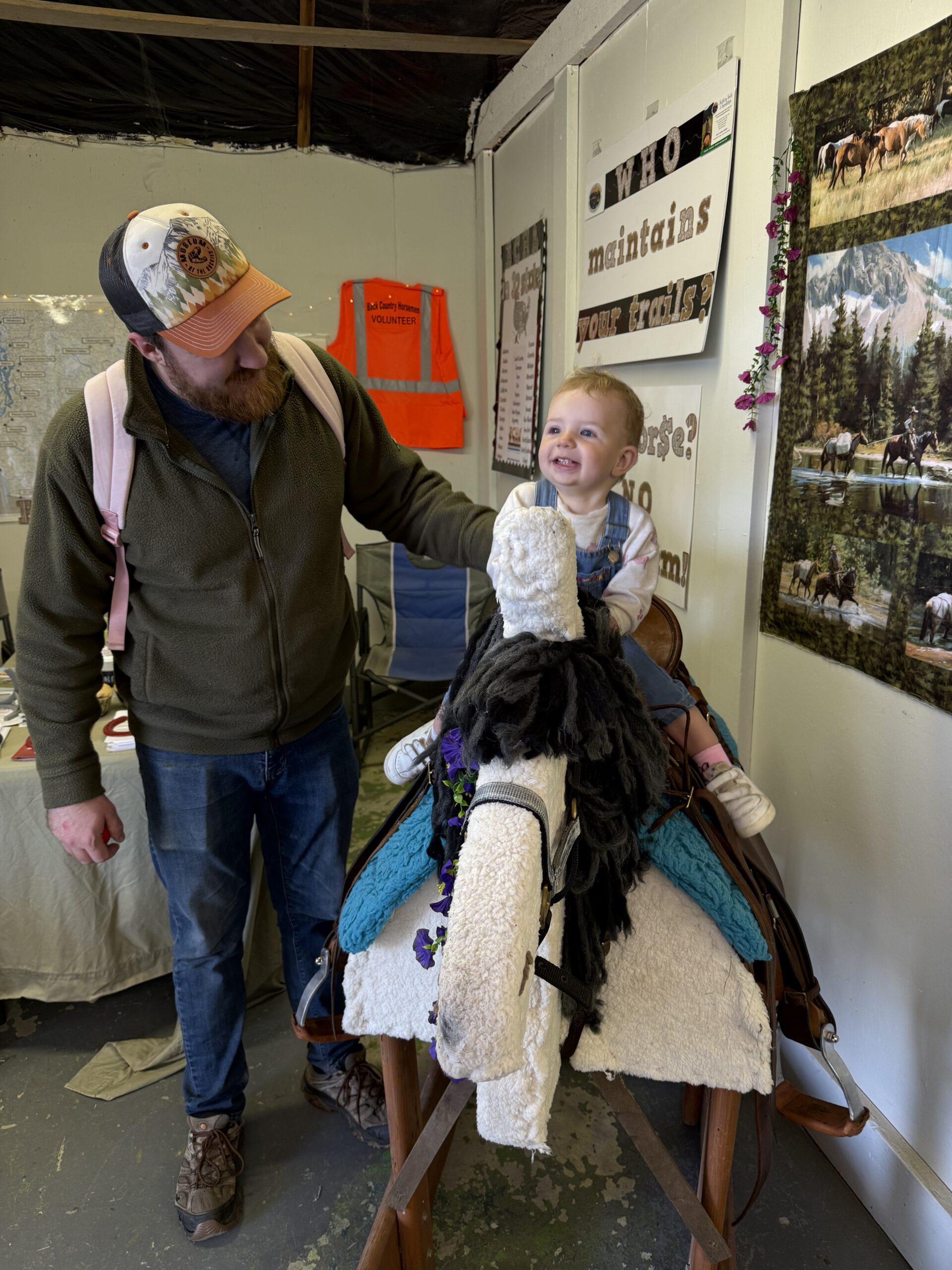 Child in Saddle with Parent
